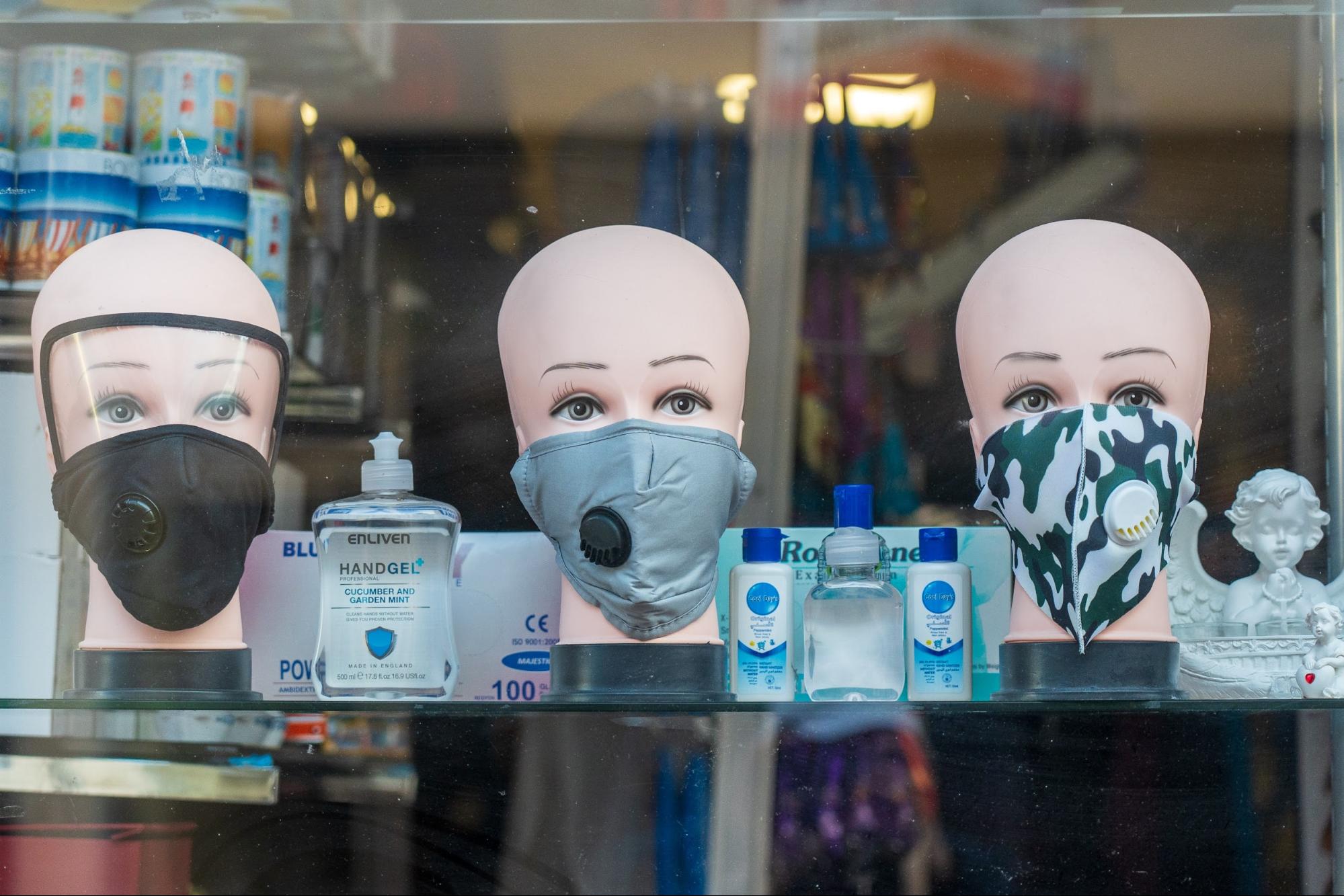 A display of masks and hand sanitizers