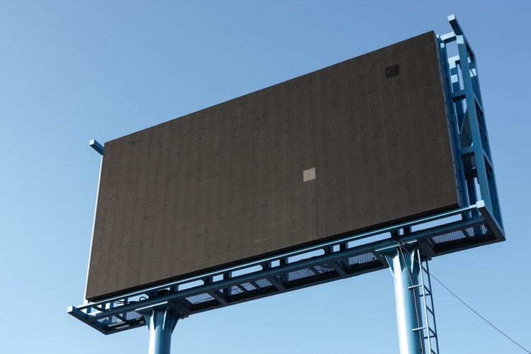 A scale with cardboard boxes