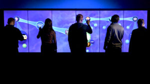 Multiple users interacting with a video wall