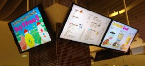 Digital menu screens in a restaurant